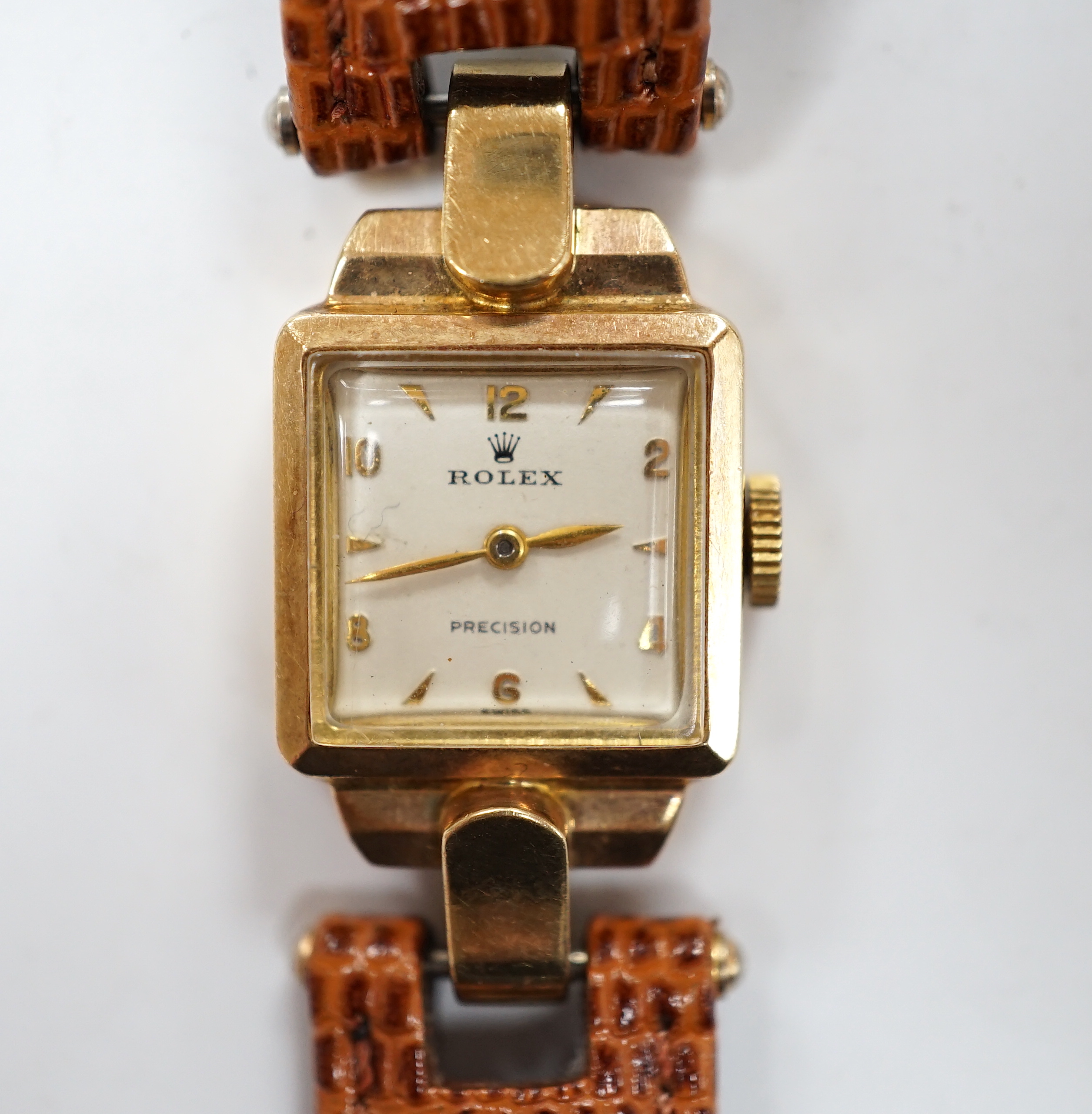 A lady's 1950's 9ct gold Rolex manual wind wrist watch, on later associated leather strap.